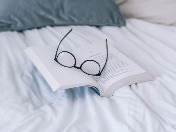 Spectacle on book